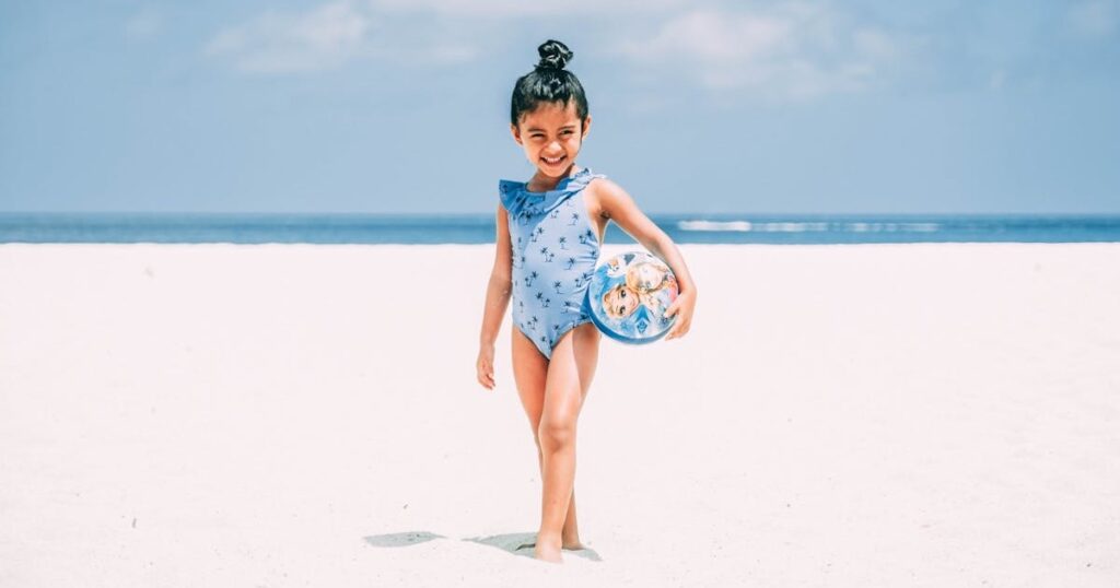 Little Girl Traveling to the Beach for the Summer